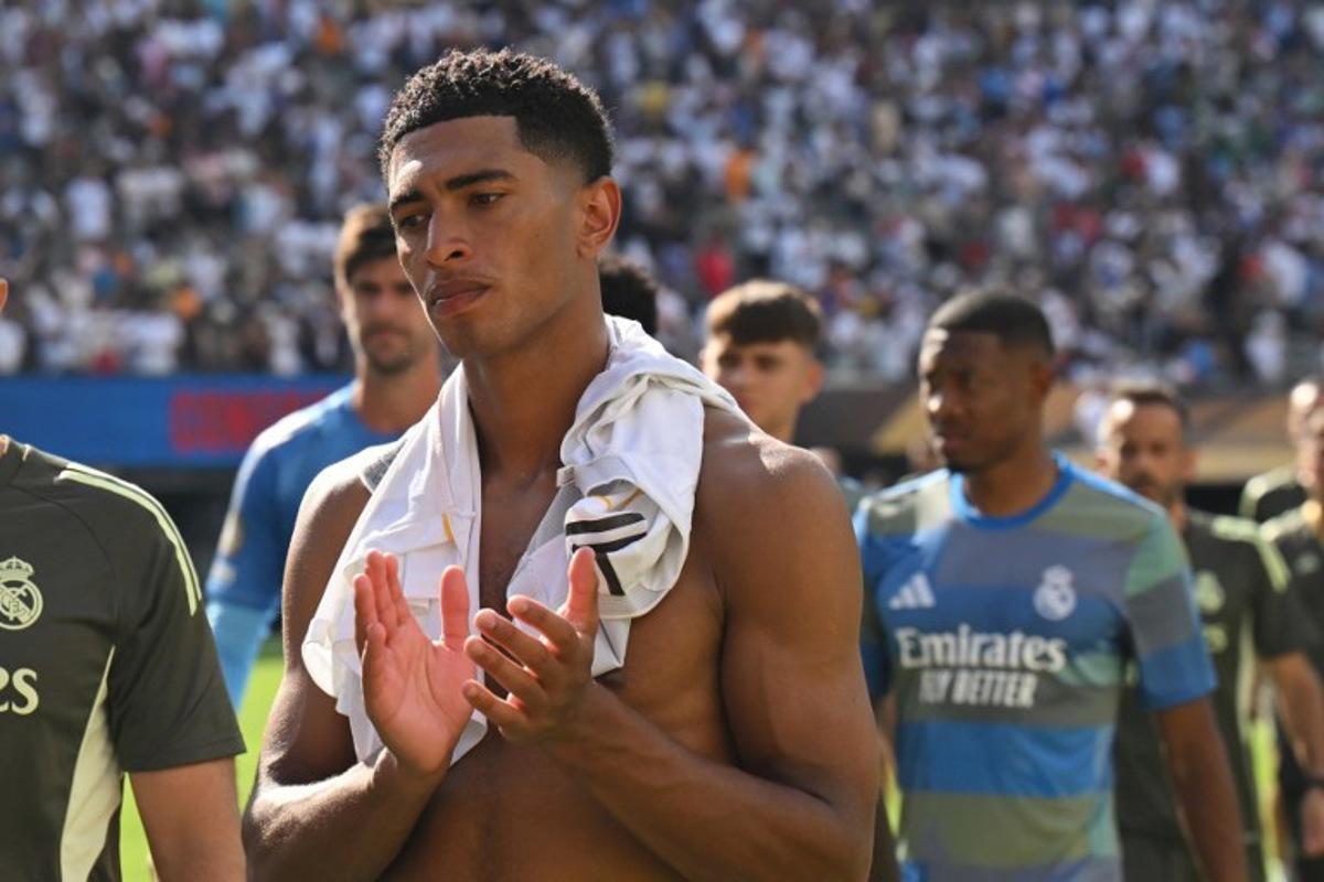 Real Madrid's English midfielder #05 Jude Bellingham reacts at the end of the FIFA Club World Cup 2025 semifinal football match between France's Paris Saint-Germain and Spain's Real Madrid at the MetLife stadium in East Rutherford, New Jersey on July 9, 2025. ANGELA WEISS / AFP