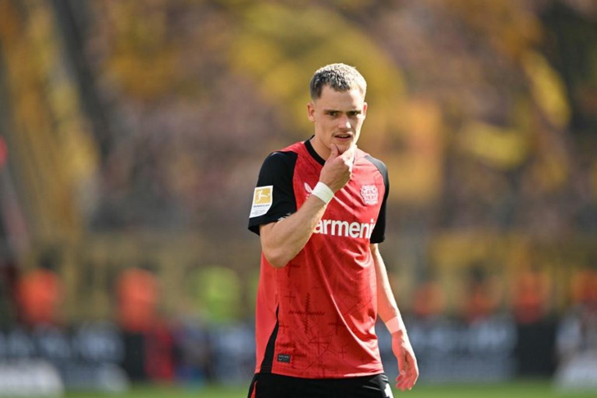Bayer Leverkusen's German midfielder #10 Florian Wirtz reacts during the German first division Bundesliga football match between Bayer 04 Leverkusen and Borussia Dortmund in Leverkusen, western Germany, on May 11, 2025. INA FASSBENDER / AFP