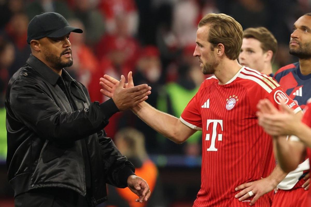 Bayern Munich's Belgian head coach Vincent Kompany (L) shake hands with his players including Bayern Munich's English forward #09 Harry Kane after the UEFA Champions League second-leg, semi-final football match between FC Bayern Munich and Paris Saint-Germain (PSG) in Munich, southern Germany on May 6, 2026. Odd ANDERSEN / AFP