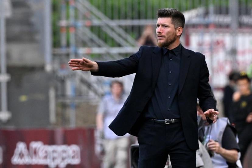 Monaco's Belgian head coach Sebastien Pocognoli gestures from the technical area during the French L1 football match between FC Metz and AS Monaco at the Stade Saint-Symphorien in Longeville-les-Metz, eastern France on May 2, 2026. Jean-Christophe VERHAEGEN / AFP